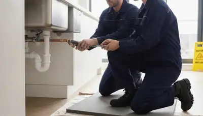 Oak Park, IL plumber repairing a residential pipe for fast plumbing repair service
